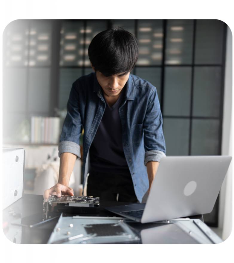 Technician working on a laptop